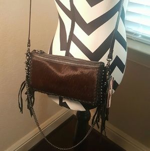 Black cowhide fringe shoulder bag